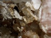 Thomasclarkite-(Y) crystals - click for larger pic