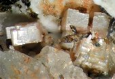 Thomasclarkite-(Y) crystals - click for larger pic